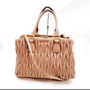 Miu Miu Light Pink Quilted Leather Handbag Authentic In Excellent Condition